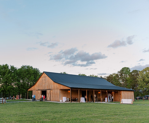 Our beautiful barn at sunset makes the perfect backdrop for your event