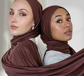 Model wearing brown jersey hijab styled in a modern wrap – FayMana Threads.