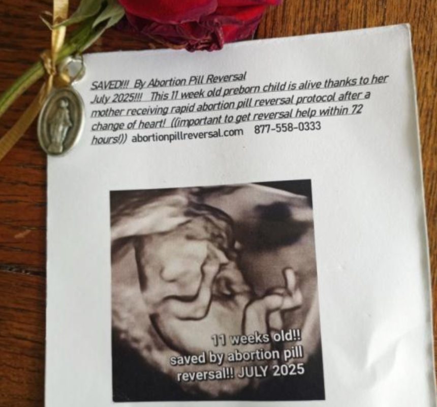 Card attached to the roses offered to the women during Red Rose Rescue