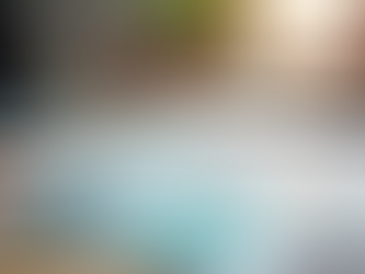 Workspace showing various branding materials and design tools