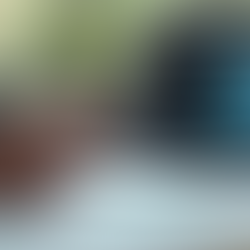 Eye-level view of a designer sketching ideas with AI-generated images on a laptop screen