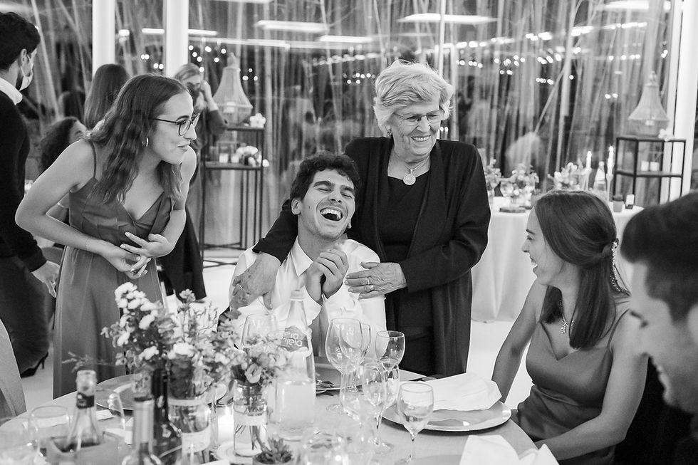 grandma with grandchildren laughing