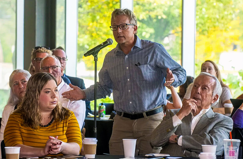 Jesse  Harper Speaking at an event at Valparaiso University