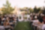 Couple getting married by the Spokane River at Chateau Rive