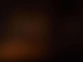Candles lit in a dark room