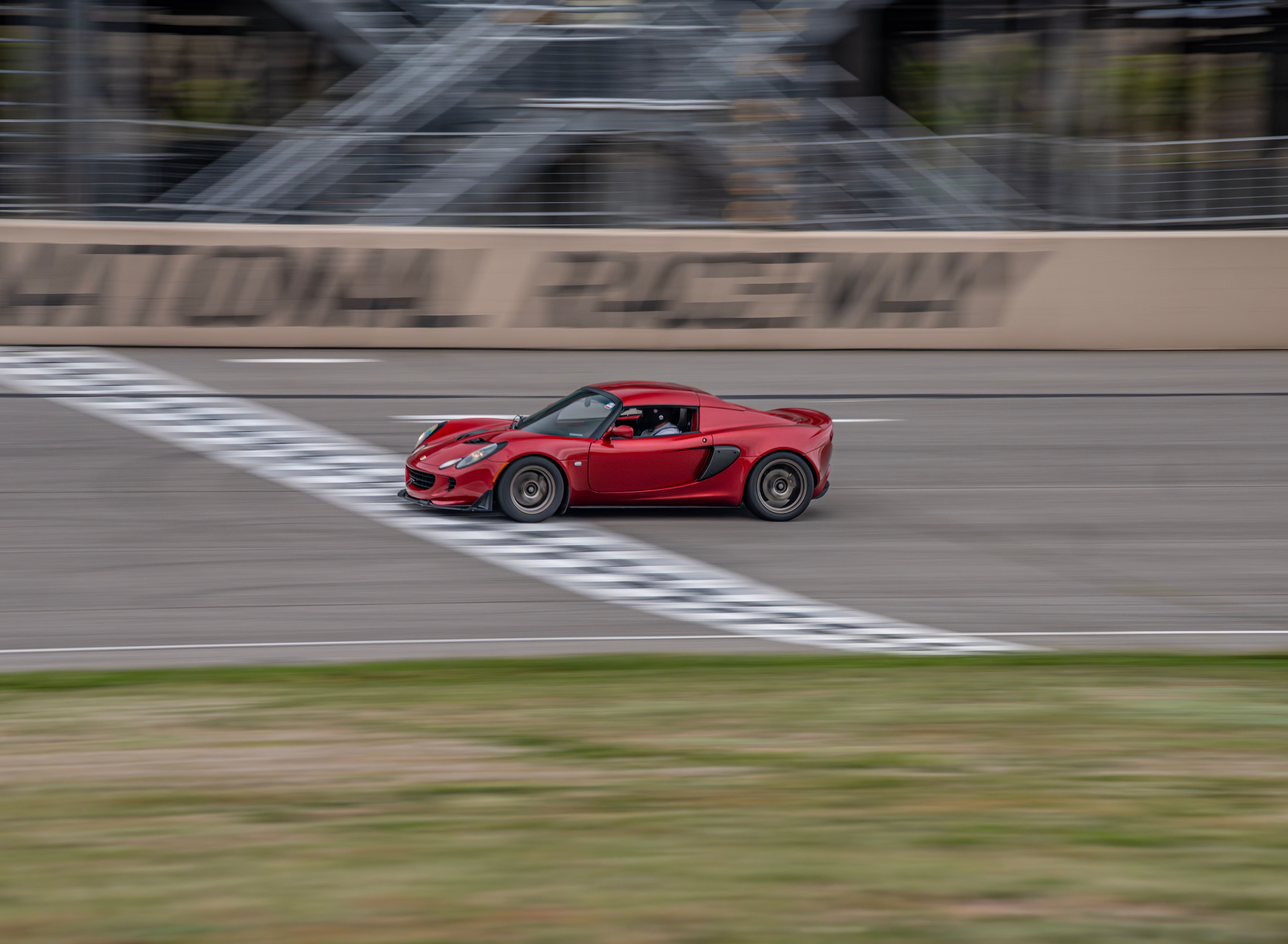 Lotus Elise crossing the line