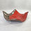 Thumbnail: Spoon Rest  with dark clay body and cinnamon red glaze