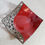 Thumbnail: Spoon Rest  with dark clay body and cinnamon red glaze