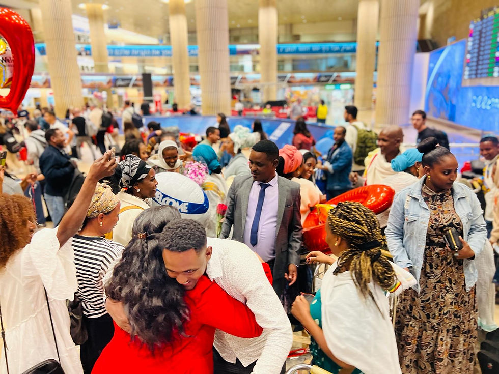 Ethiopian families embrace at Ben Gurion Airport (Credit JAFI)