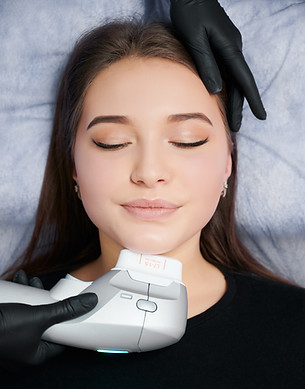 beautician-doing-cleaning-face-for-young-cute-woma-2023-11-27-04-54-23-utc.jpg