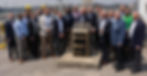 Assistant Secretary of Environmental Management (EM) Tim Walsh (right of monument) and EM Principal Deputy Assistant Secretary Joel Bradburne (right, back row) joined senior managers from the Department of Energy Savannah River Operations Office and Savannah River Mission Completion and other personnel who contributed to the milestone to commemorate Tank 14 reaching preliminary cease waste removal.