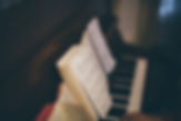 Sheet Music Over Piano