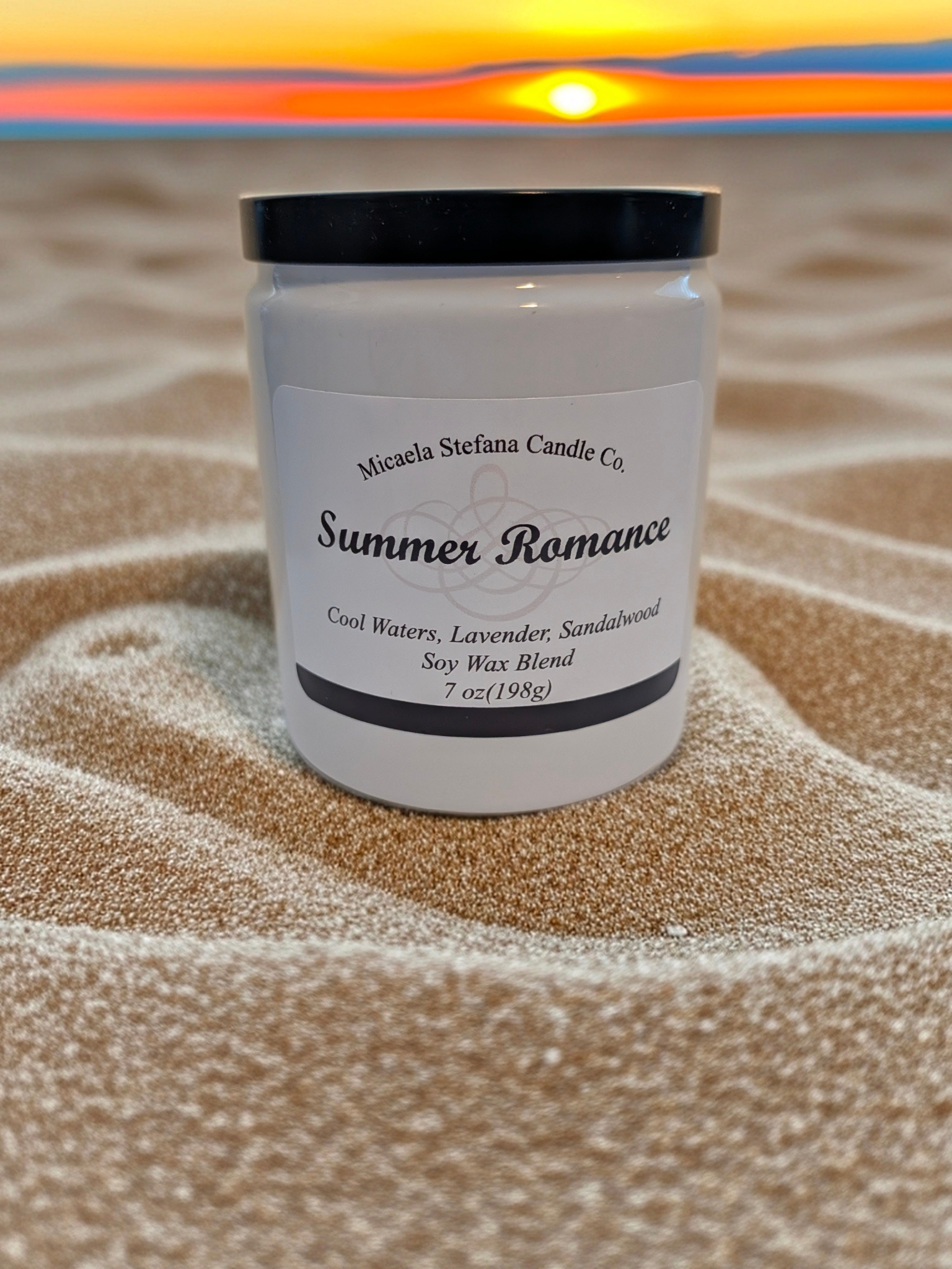 7oz. Summer Romance candle in a white ceramic jar with a black metal lid.
