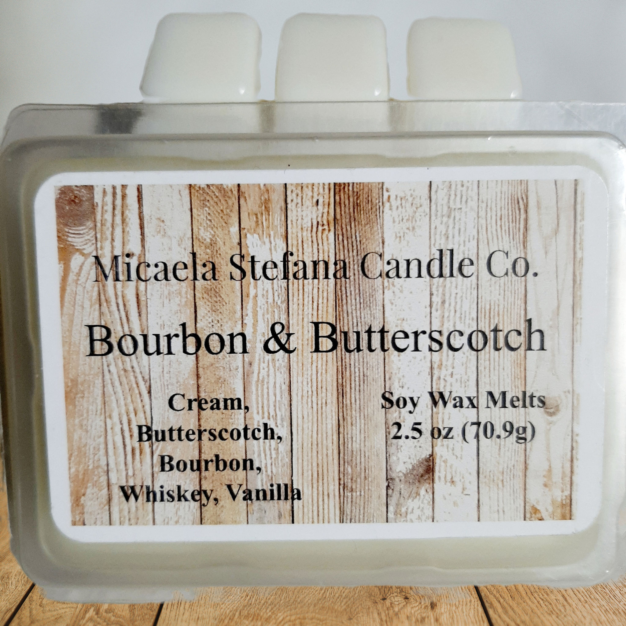 A six pack of Bourbon and Butterscotch Soy Wax Melts. Front view.