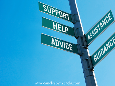 Signpost with multiple directional signs reading: SUPPORT, HELP, ADVICE, and GUIDANCE.