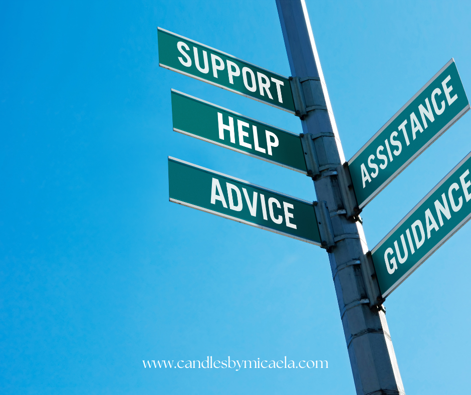 Close-up view of a lit eco-friendly candle on a wooden table