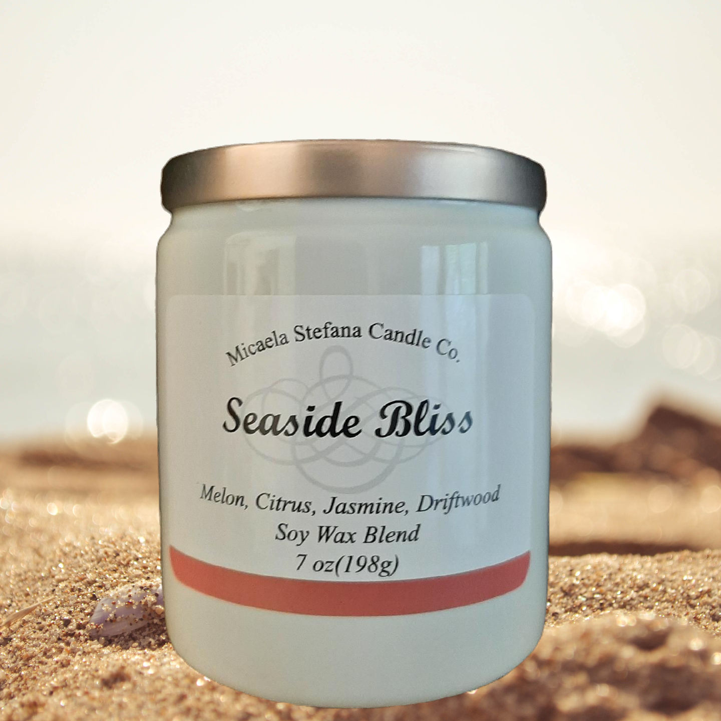 Seaside Bliss candle in a 7oz. white ceramic jar with a rose gold flat lid.