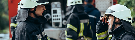 selective-focus-of-firefighters-having-conversatio-2022-11-02-02-10-17-utc.jpg