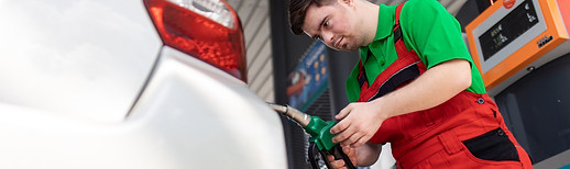 down-syndrome-man-employee-fueling-car-at-gas-stat-2022-11-18-10-03-47-utc.jpg