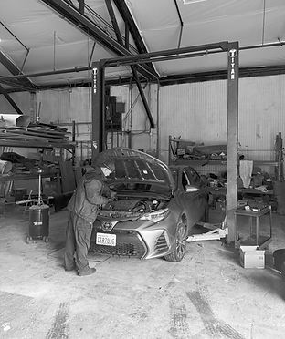 mechanic working on car