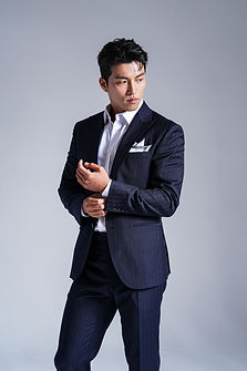 Stylish business portraits of Asian man in suits.jpg