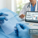 Medical illustration titled Is Hernia Mesh Safe showing a surgeon holding a hernia mesh insert.