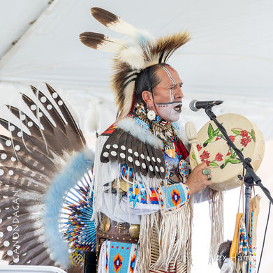Fabian Fontenelle singing with a drum