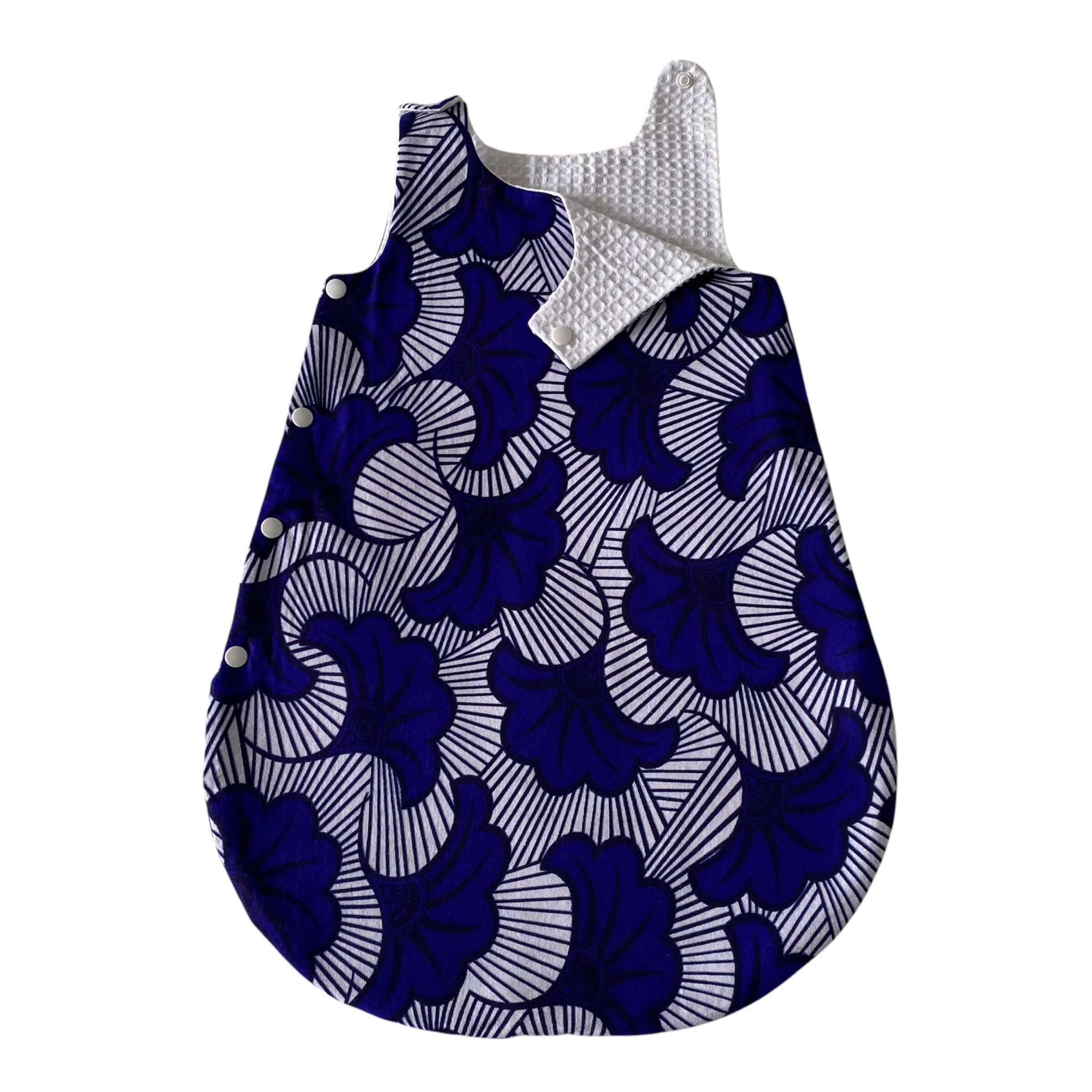 Une Gigoteuse Turbulette en Tissu Nid d'abeille et Wax Fleurs Bleues