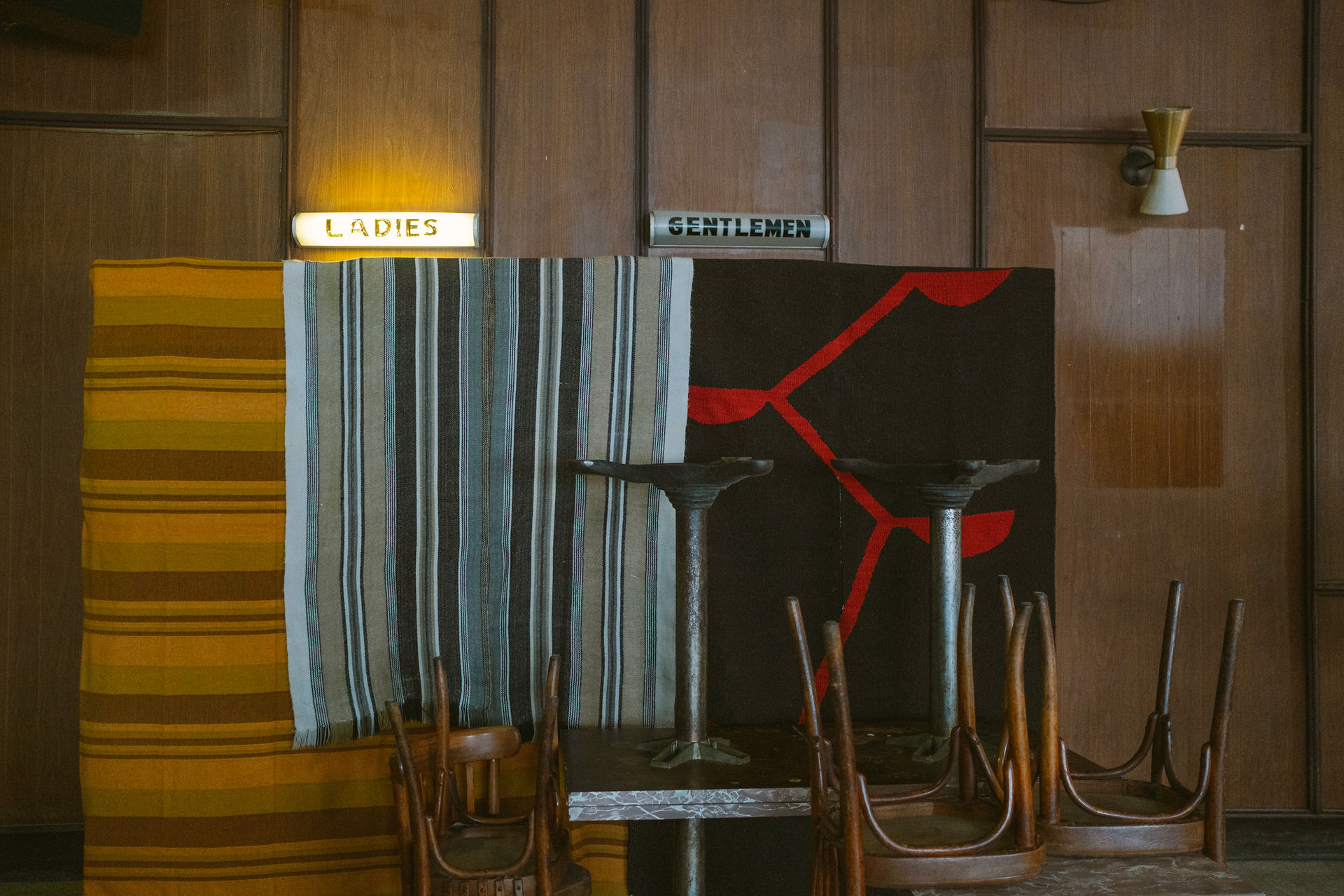 Detail shot at Gavan's hotel of entrance into restrooms. Ladies and Gentelmen.