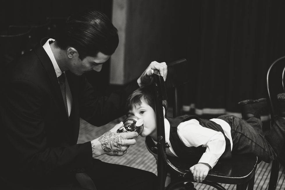 Father with son at the Metropolitain Brasserie before wedding ceremony in Ottawa Ontario