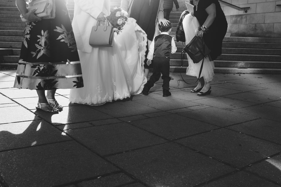 Detail of bride arriving downtown Ottawa for her wedding ceremony at the Metropolitain Brasserie. 