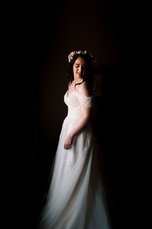 Bride posing at the Chateau Laurier before walking down the aisle at the Metropolitain Brasserie In Ottawa. 