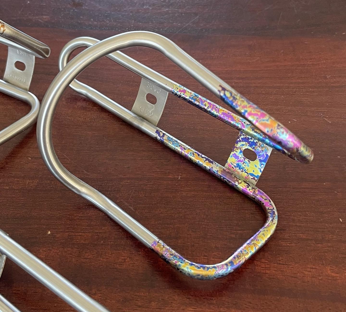 Anodized titanium bottle cages