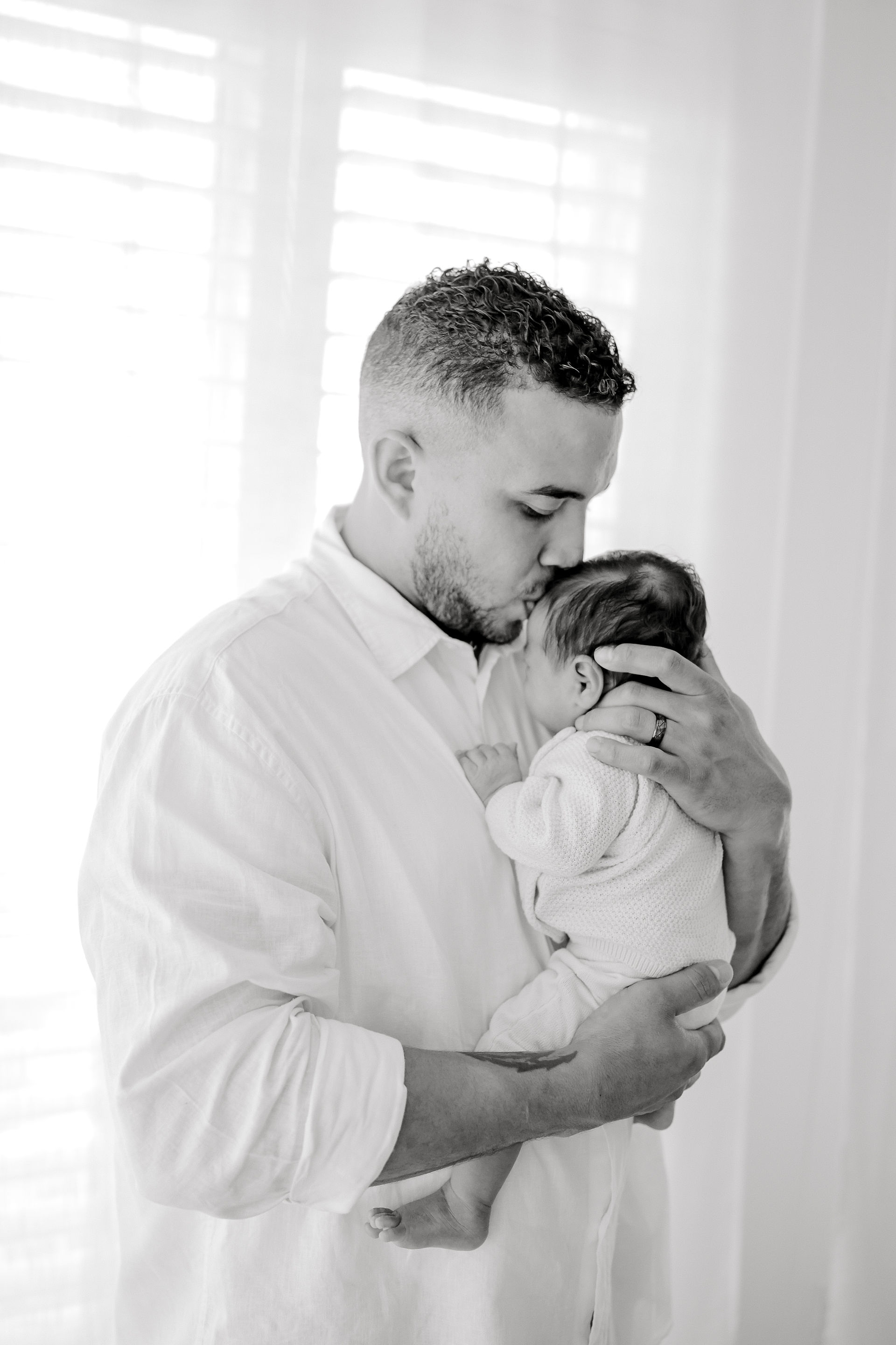 lifestyle newborn photography session in a studio Jacksonville, Florida