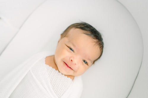 lifestyle newborn photography session in a studio Jacksonville, Florida