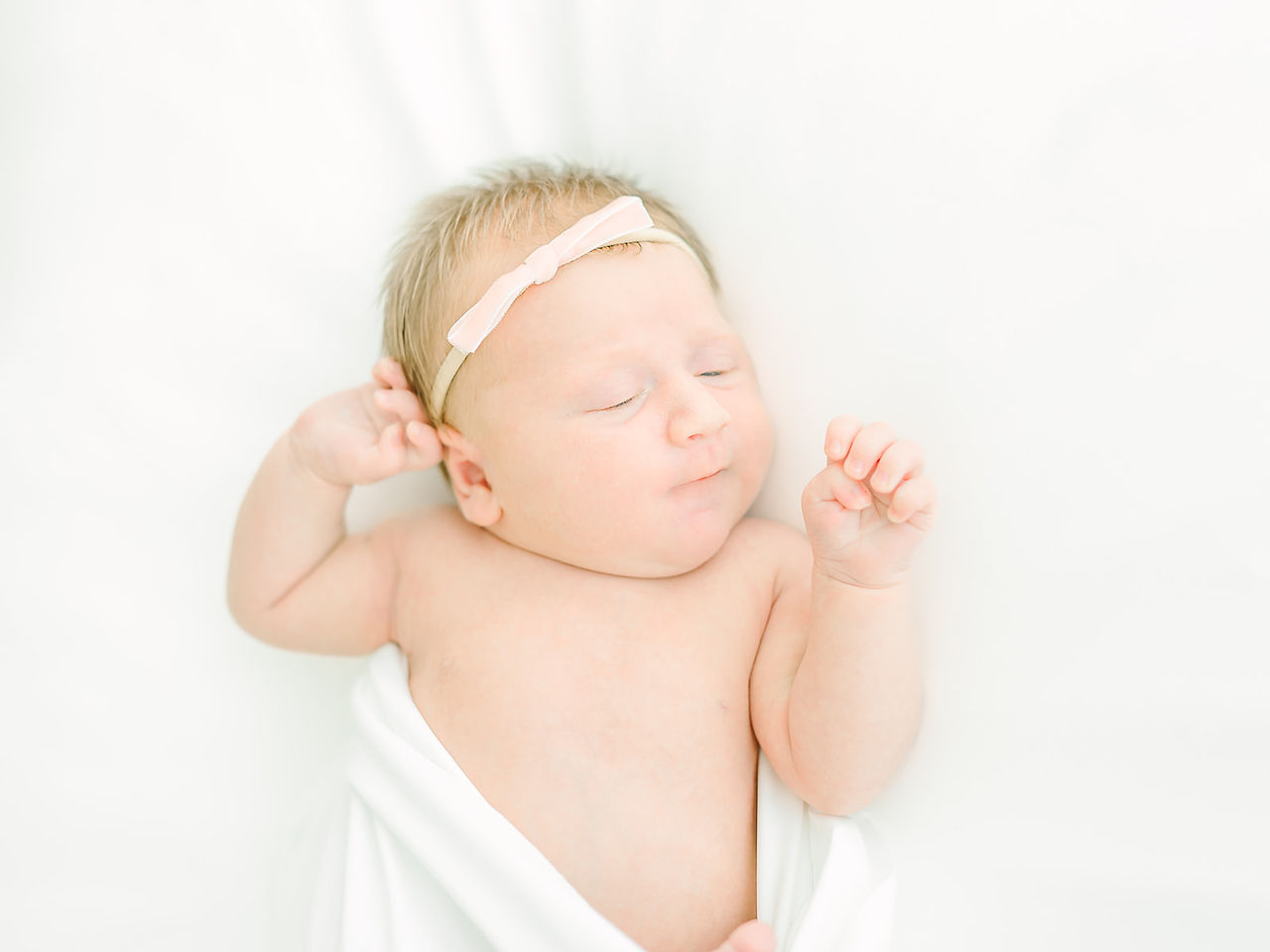 newborn photos in a white studio in jacksonville beach, lifestyle