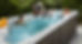 A family in a garden pool.