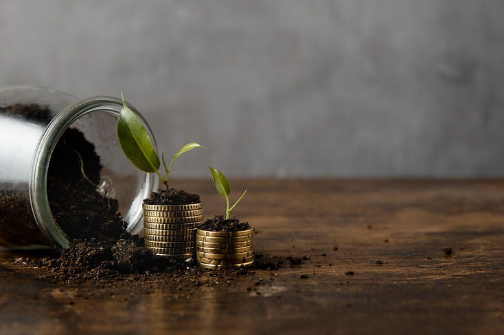 jar-with-dirt-stacked-coins-with-copy-space.jpg