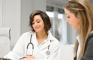 female_doctor_talking_with_female.jpg