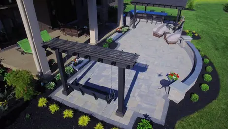 Aerial view of a patio with pergolas and seating area.