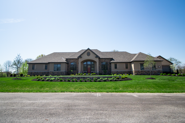 Large ranch-style home in Galena, OH with green lawn.