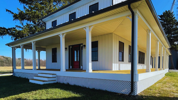 Farmhouse renovation in Willard, Ohio showing updated electrical work and framing — part of full structural rebuild by Pegasus Builders.