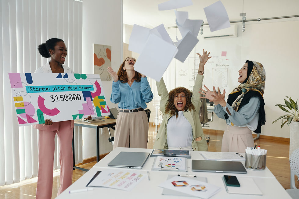 team celebrating winning a pitch
