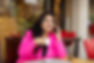 a-smiling-indian-businesswoman-is-talking-on-her-m-2022-11-15-08-59-27-utc.jpg