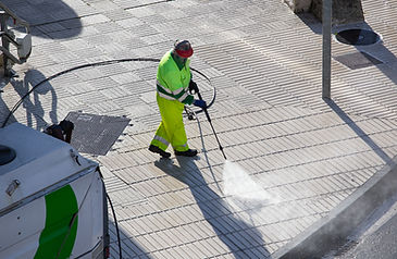 worker-cleaning-a-sidewalk-with-high-pressure-wate-2026-01-08-05-52-30-utc.jpg