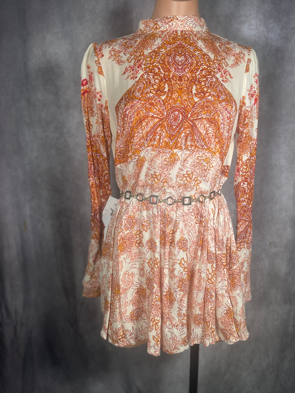 Thumbnail: Beige Knit Cardigan with Paisley Print Dress and Chain Belt Ensemble