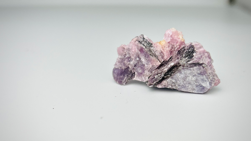 front of lepidolite pink tourmaline