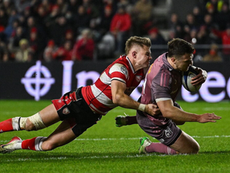     Tom Farrell of Munster scores his side's fourth try despite the tackle of Charlie Atkinson of Gloucester at SuperValu Páirc Ui Chaoimh. Picture: Brendan Moran/Sportsfile
