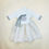Thumbnail: Baby girl hanbok with white jeogori, gray trim and ribbon, and sage green patterned chima with embroidered medallion