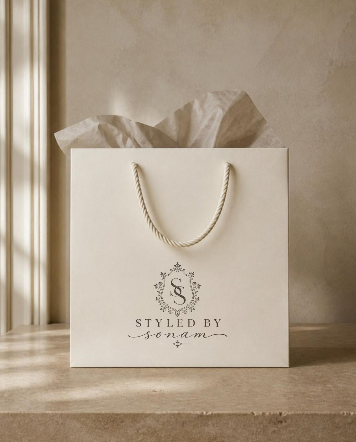 Cream Styled by Sonam shopping bag with rope handles and tissue paper